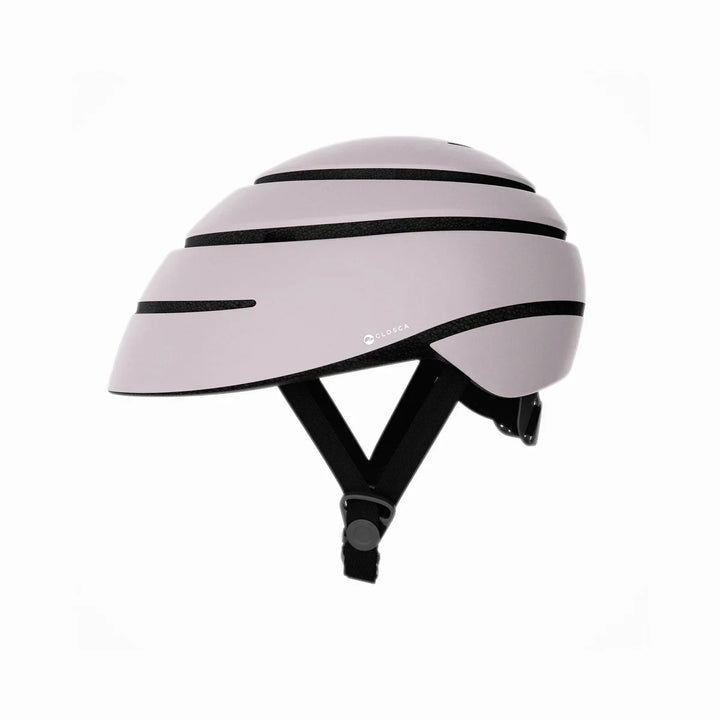 Fahrradhelm in Pastellrosa mit schwarzen Streifen, modernes Design, seitliche Ansicht