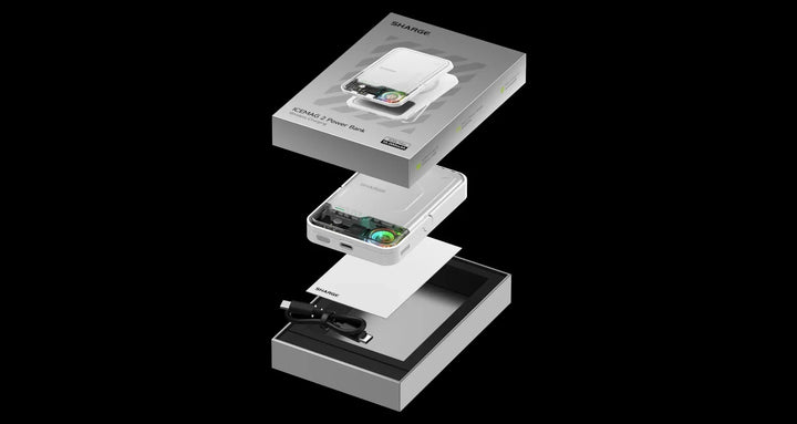 SHARGE ICEMAG 2 Powerbank mit Verpackung, Kabel und Bedienungsanleitung auf schwarzem Hintergrund