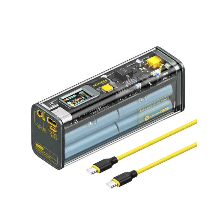 Shargeek 100 Powerbank mit durchsichtigem Gehäuse und gelbem USB-C Kabel, Batterien sichtbar
